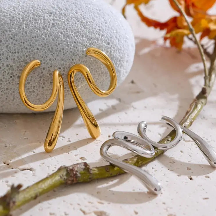 Liquid-inspired ear cuff for non-pierced ears