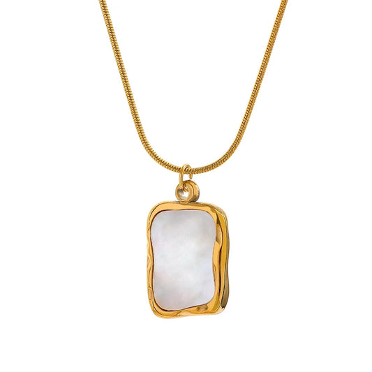 Gold necklace with irregular shell-shaped pendant