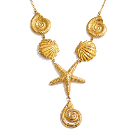 Starfish and shell pendant necklace in gold
